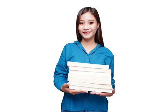 Young female student carrying a lot of books