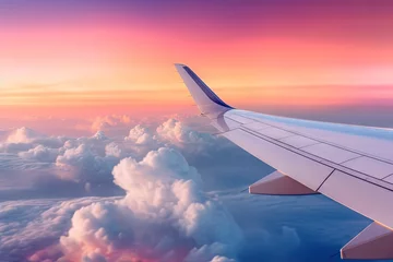 Rolgordijnen The wing of an airplane soaring through the sky © pham