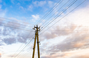 Power electric pole with line wire on colored background close up