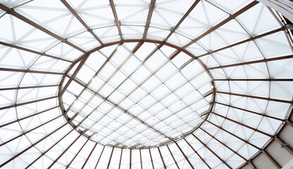Metal and glass roof of a mall - Powered by Adobe