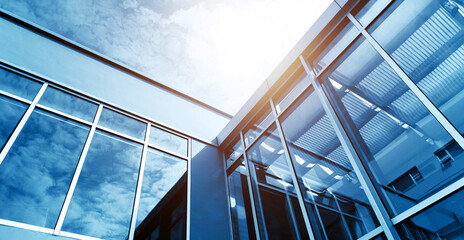 Fototapeta na wymiar Group of glass windows on modern office building