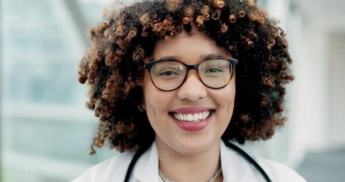Face, happy doctor and woman with glasses in hospital for healthcare, wellness and career. Medical professional, portrait and surgeon smile, expert and employee from South Africa in health clinic