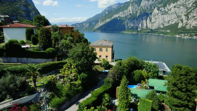 Amazing Villa on Lake Como, Italy. A luxury residence located on the shore of Lake Como overlooks the amazing landscape. The real estate has an outside pool and a private big garden