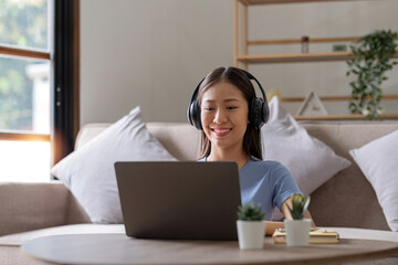 Asian girl student online learning class study online video call zoom teacher, Happy asian girl learn english language online with computer laptop...