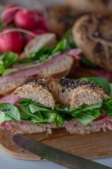 home made whole grain Bagels with cheese on a table