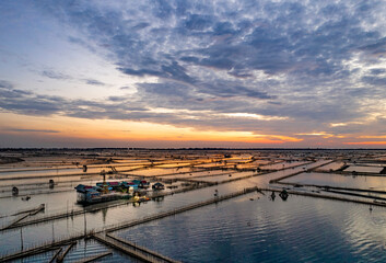 Naklejka na ściany i meble Sunrise in the Tam Giang lagoon, Hue city, Thua Thien Hue province, Vietnam.