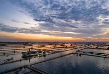 Fototapeta na wymiar Sunrise in the Tam Giang lagoon, Hue city, Thua Thien Hue province, Vietnam.