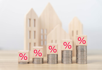 A coin with a percentage icon and an up or down arrow. bank interest rate Rising home interest	
