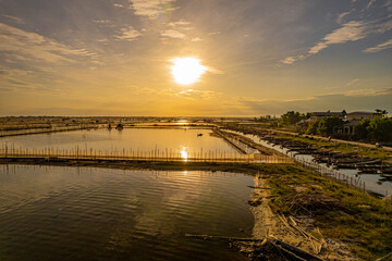 Obraz premium Sunrise in the Tam Giang lagoon, Hue city, Thua Thien Hue province, Vietnam.