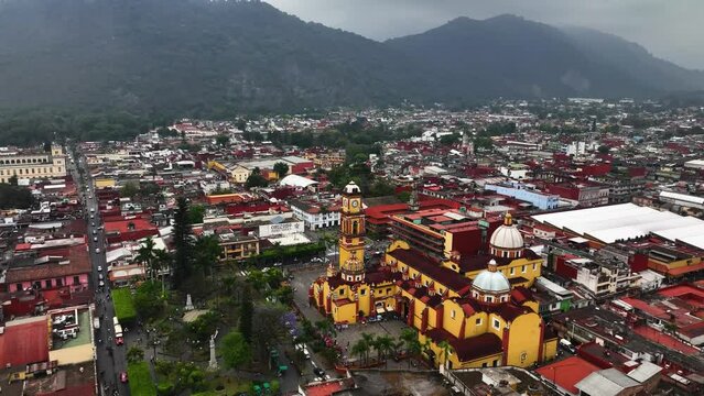 Aerial view backwards over the Orizaba Cathedral, cloudy day in Veracruz, Mexico