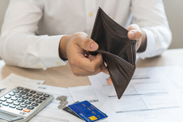 Stressed, Problem people asian man, male holding and open an empty wallet not have money, credit card, not to payment bill, loan or expense in pay. Bankruptcy, bankrupt and debt financial concept.