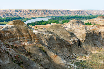 Dinosaur Provincial Park panorama: Vast badlands, rich with fossils, under endless skies....