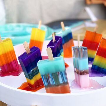 Vibrant popsicles in trendy colours. Holidays and party concept. AI generative illustration. 