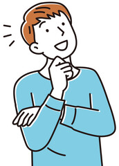 上を見上げて喜ぶ若い男性