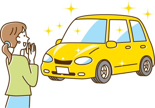 ピカピカのかわいい黄色の自動車を見て喜ぶ女性