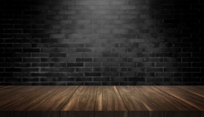 empty old wood table at foreground with black brick wall in dark room background for product placement. rustic wooden table with light from above.