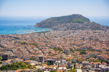 Fototapeta na wymiar Panorama view of Alanya city from the hill in sunny day, Turkey