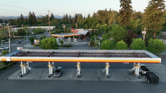 An empty gas station in the evening.