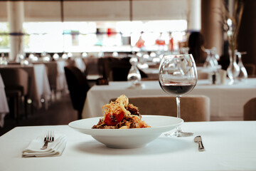 Special meat dinner and red wine at a luxury restaurant