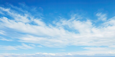 Naklejka na ściany i meble Summer sky. Blue and white cloudscape. Nature beauty. Abstract sky with clouds. Sunlight beautiful view