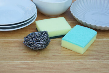 Sponge scrubbers and stainless steel wool scrubbers for washing dishes.Concept, kitchen utensils, cleaning equipment in daily life. Household. Copy space for text.  