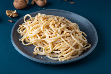 Spaghetti with walnut cream. Simple, nutritious and tasty dish suitable for those who follow a vegetarian diet.