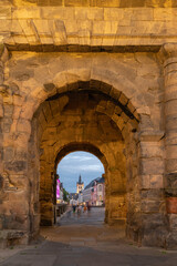 View through  the Porta Nigra,at sunset,  a Roman City Gate built after 170 AD and located in Trier, Germany