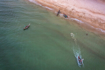 Fototapeta na wymiar Fisherman Boat Sunset Time in the Phu Hai beach, Phu Vang, Thua Thien Hue, Vietnam