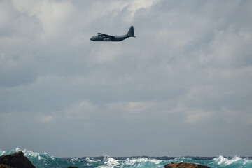 Old airplane flying in the sky