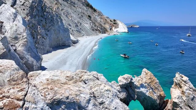 Aerial view of the beautiful Lalaria beach at Skiathos Island, Sporades, Greece, with turquoise shining sea and steep cliffs