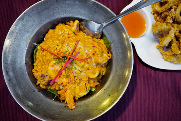 Steamed seafood curry pudding in hot pot, Thai cuisine