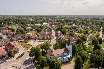 Fototapeta na wymiar Aerial view of the city center and Saldus Lutheran Church. Saldus, Latvia