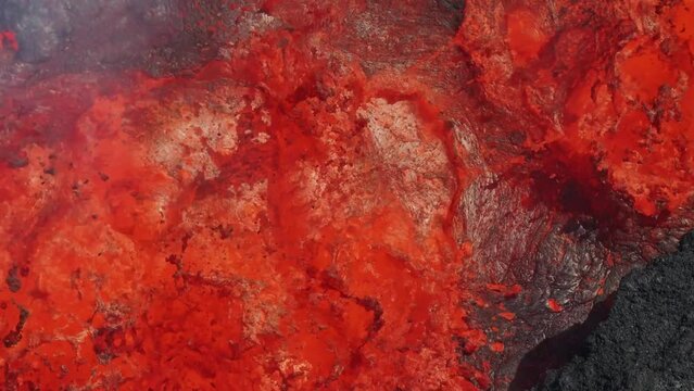 Aerial view of Litli-Hrutur (Little Ram) Volcano during an eruption on Fagradalsfjall volcanic area in southwest Iceland, it's a fissure eruption started on the Reykjanes Peninsula, Iceland.