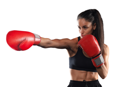 Kickboxing woman in activewear and red kickboxing gloves on a transparent background performing a martial arts kick. Sport exercise, fitness workout.