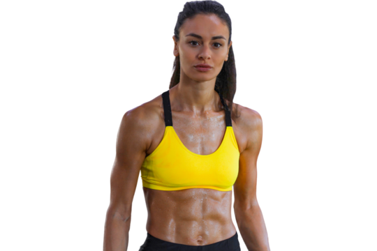 Muscular fit woman standing on a transparent background, looking at camera.