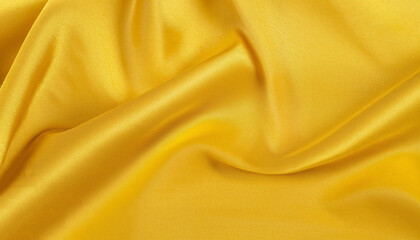 Yellow golden fabric texture background, detail of silk or linen pattern.