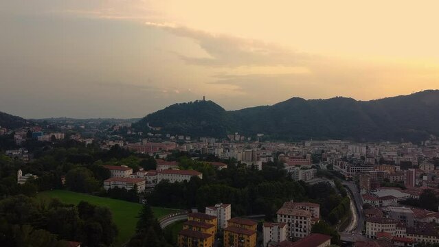 Panoramic view of Como city and Castello Baradello at sunset