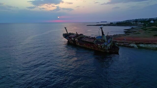Drone pushes over the Edro lll Shipwreck at sunset.