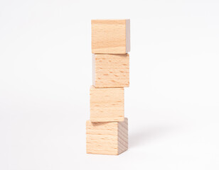 Four empty wooden cubes with place for letters or images