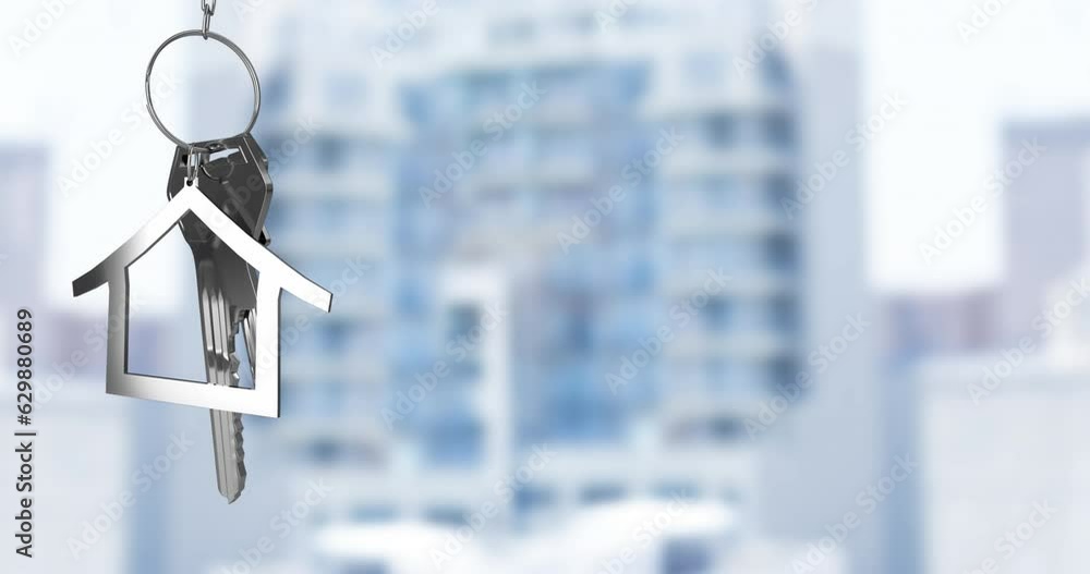 Poster animation of hanging silver house keys against blurred view of a tall building with copy space