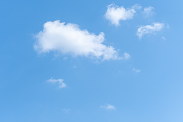 Clear blue sky and white clouds. White fluffy clouds in the blue sky. Beautiful white cloud on clear blue sky as nature concept .