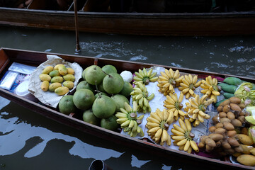 Fruit and local food sell on boat at floating  market