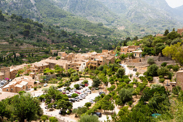 Fototapeta premium View of a medieval street in the Old Town of the picturesque Spanish-style village Fornalutx, Majorca or Mallorca island