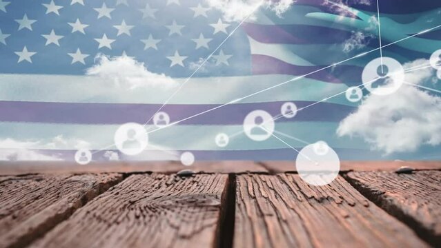 Animation of connected profile icons over flag of america, clouds and wooden table