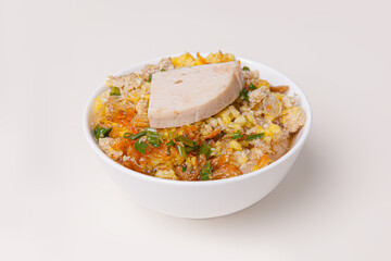 Banh Duc, Vietnamese rice cake with pork, fried onions, fish sauce, Vietnamese food isolated on white background, closeup