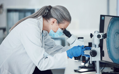 Senior woman, science and lab microscope for research and work for medical analysis. Scientist,...