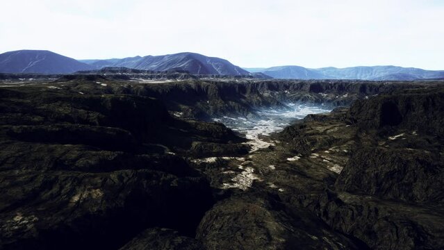 black volcanic basalt rock formations in the low light