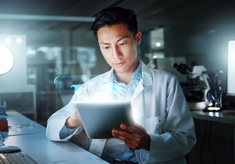 Tablet, hologram and scientist with digital innovation, global data and 3d overlay in laboratory. Asian man, doctor and information technology for futuristic medical research with healthcare study