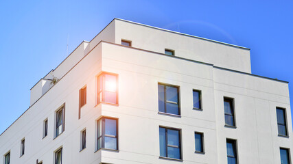 Modern apartment building in sunny day. Exterior, residential house facade.