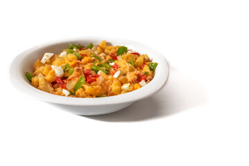 Dressed potato salad (papas aliña). Isolated on a white background. Spanish food concept.